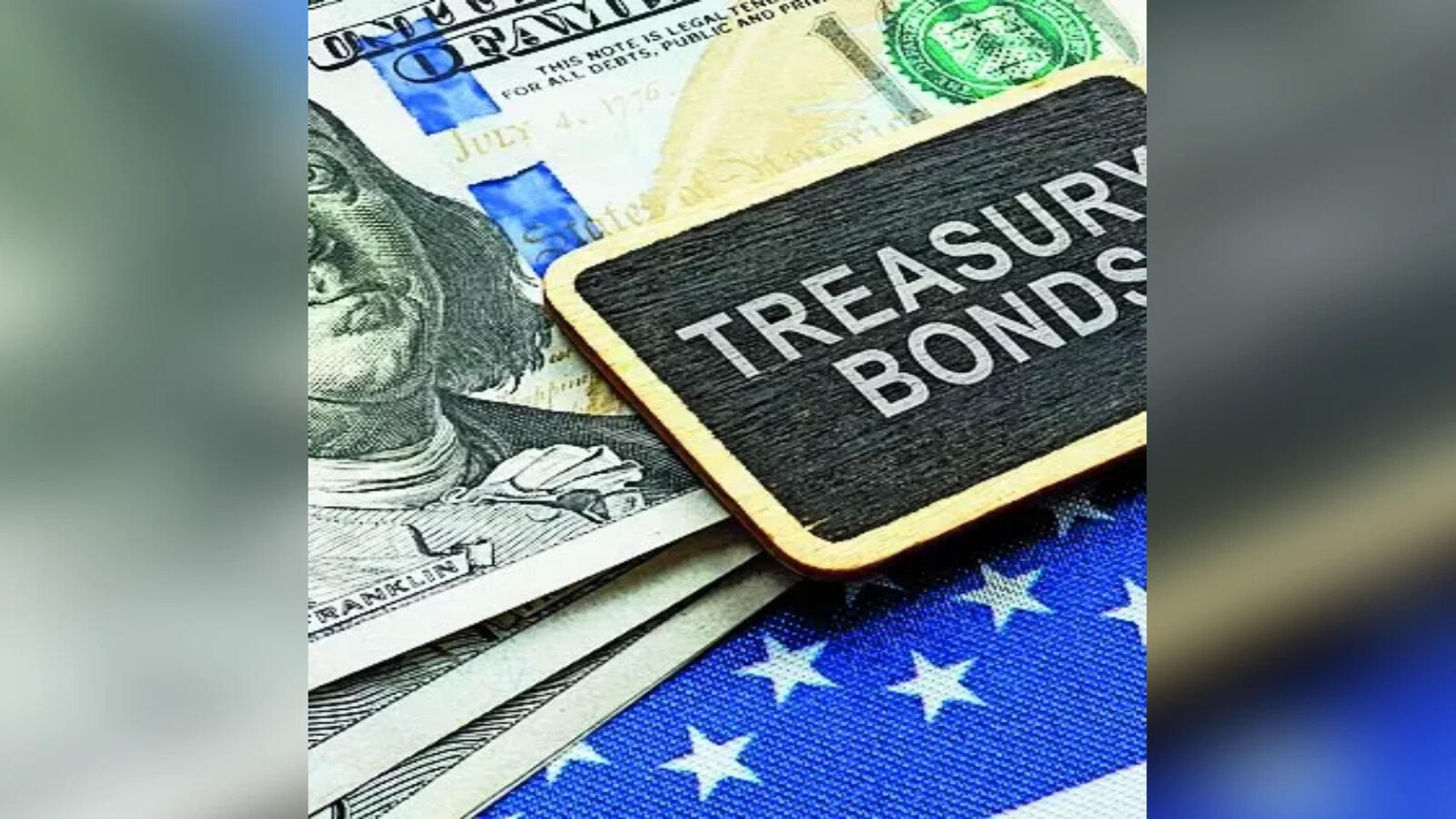 stack of US dollars and treasury bonds