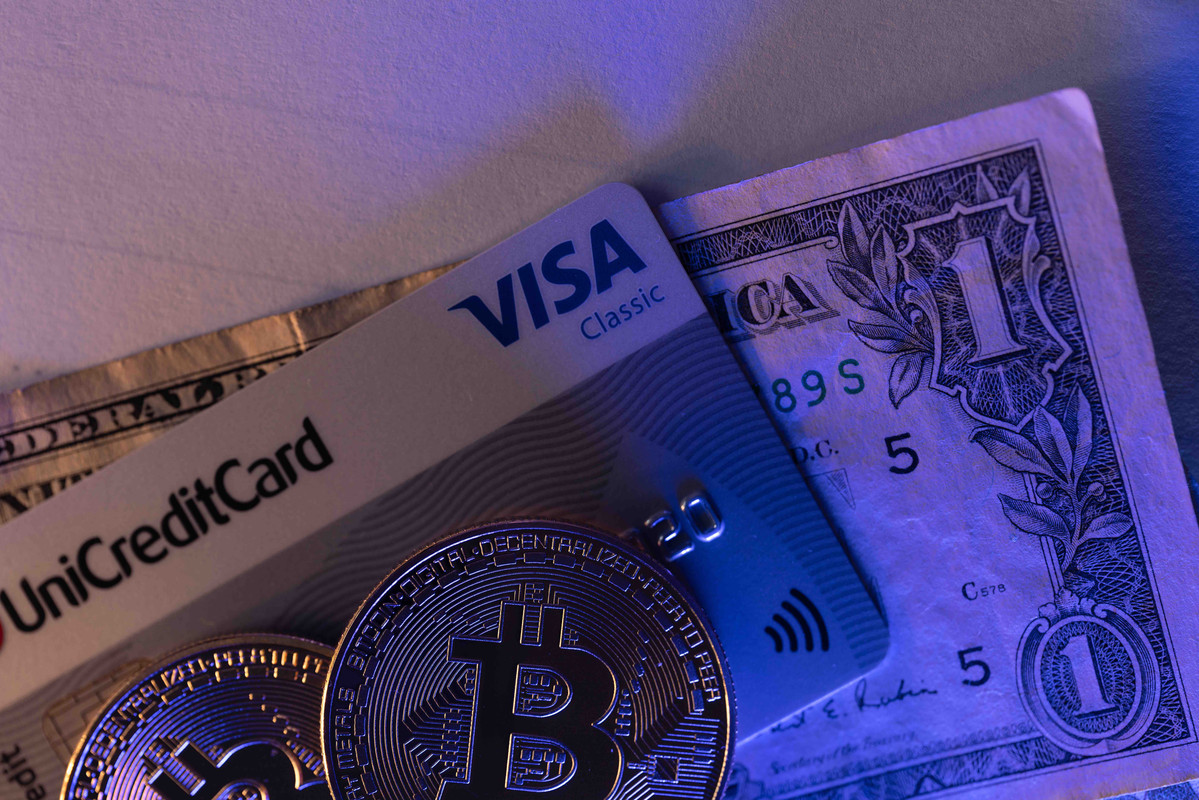 stablecoin card protecting against currency volatility