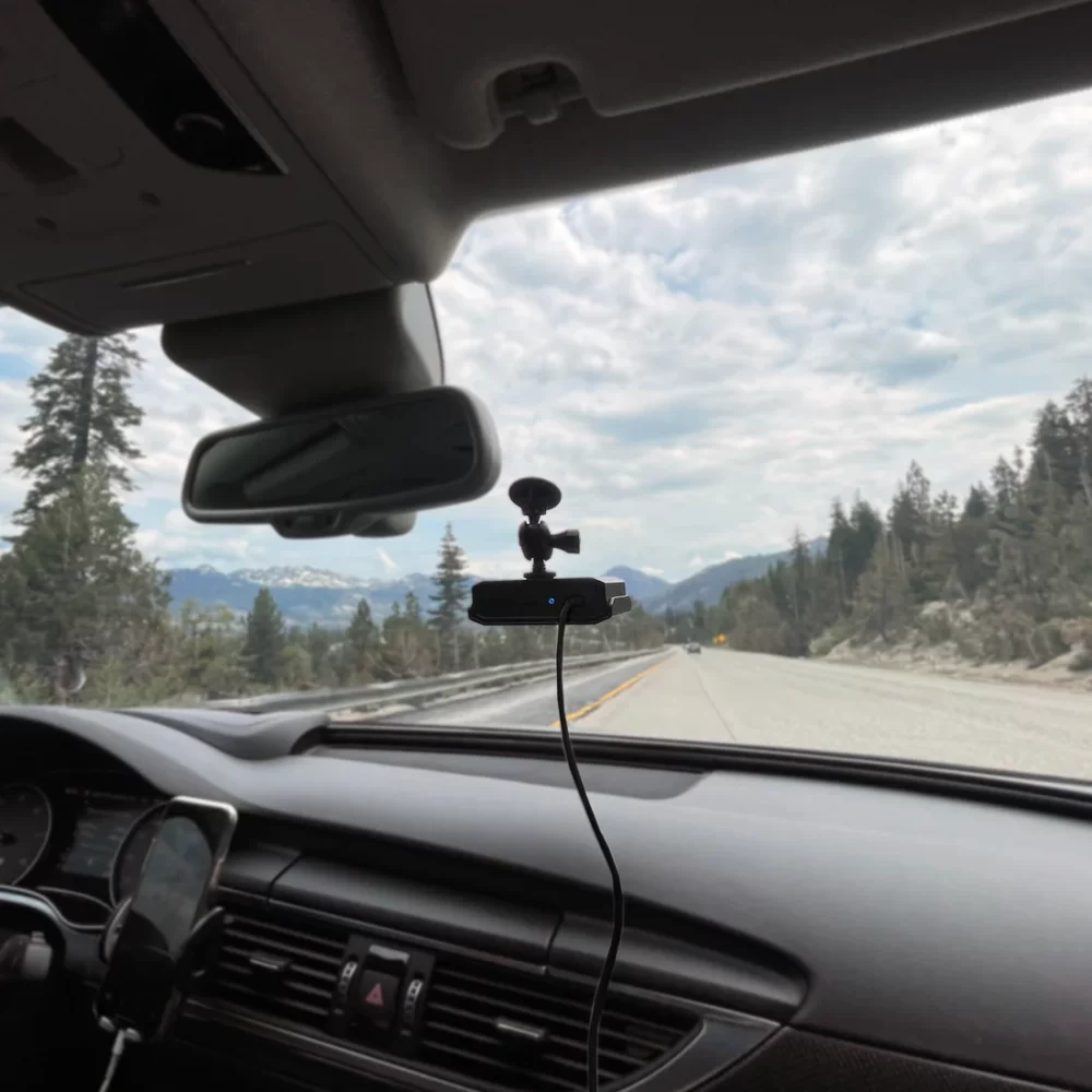 Hivemapper dashcam mounted in a car