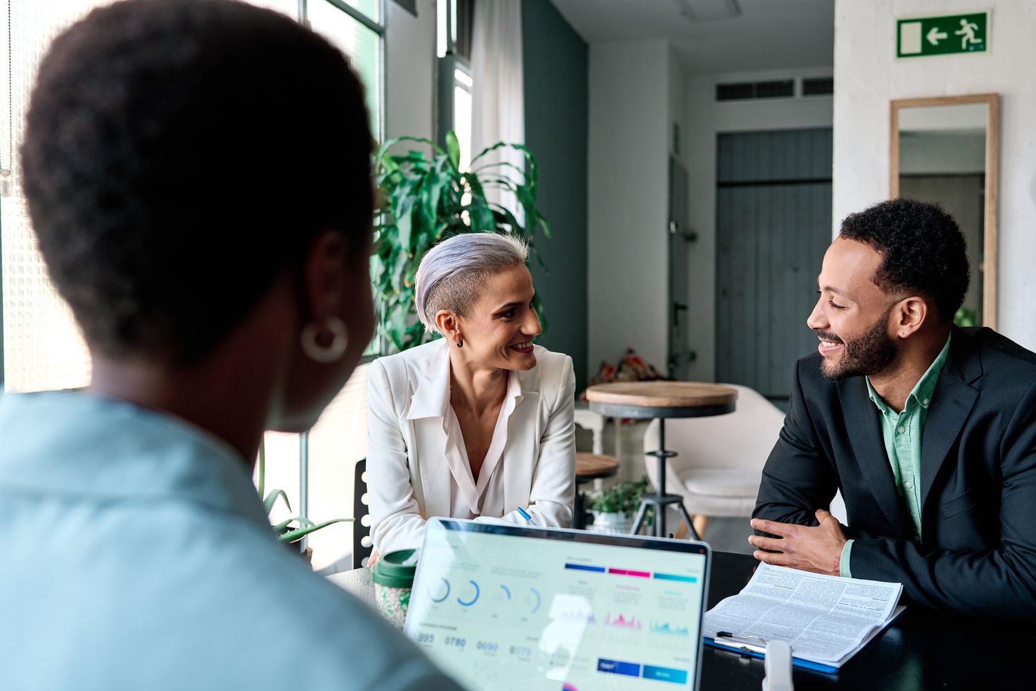 diverse group of small investors in real estate