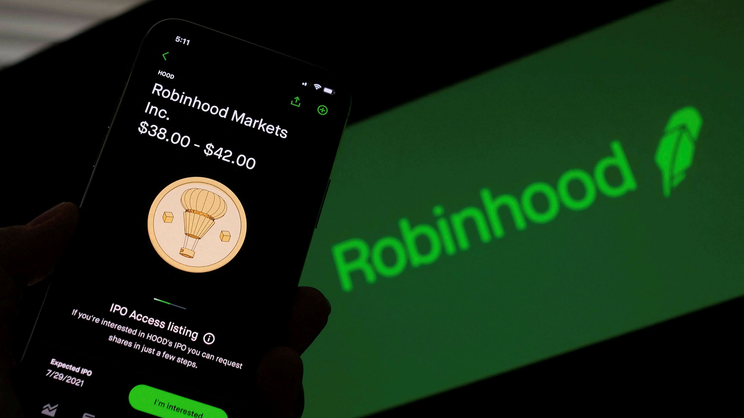 Beginner using Robinhood app on smartphone to trade cryptocurrencies