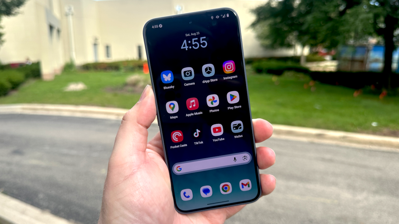 Close-up of Solana Saga phone showing DeFi dashboard with wallet balances and charts, highlighting secure mobile crypto trading experience