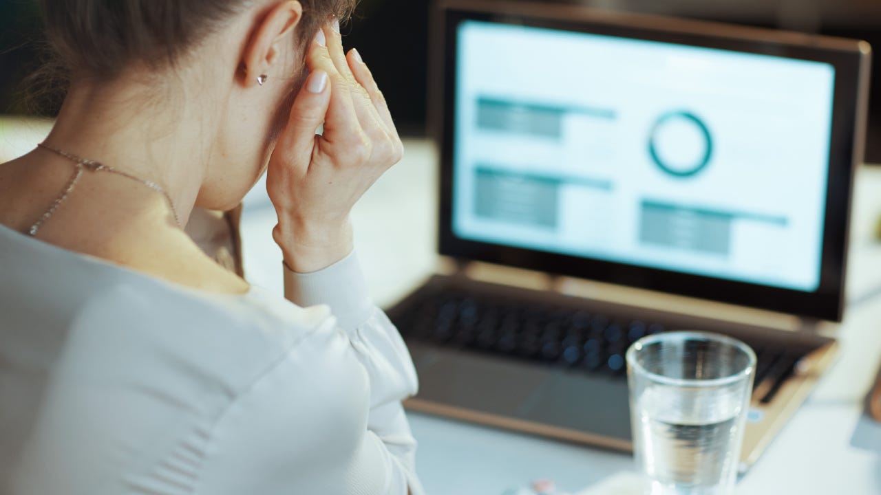 Confident investor researching cryptocurrency options for their 401(k) retirement plan on a laptop at home