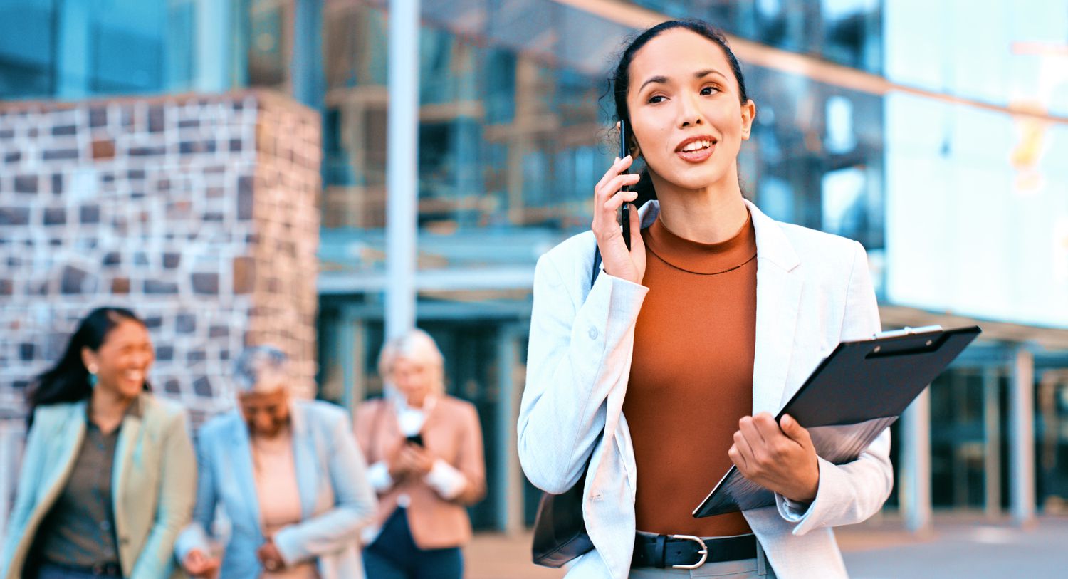 Diverse group of professionals discussing a digital dashboard displaying cryptocurrency allocations in a 401(k) retirement plan