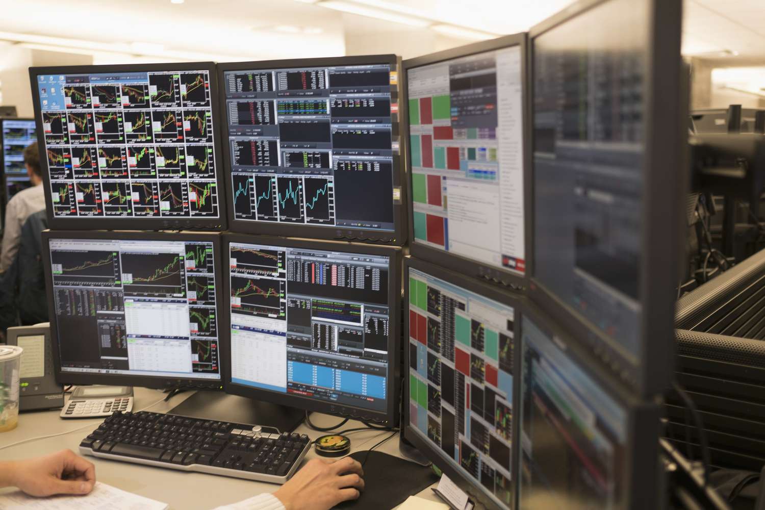 Dynamic DeFi dashboard displaying real-time auction data streams across multiple monitors in a modern trading environment