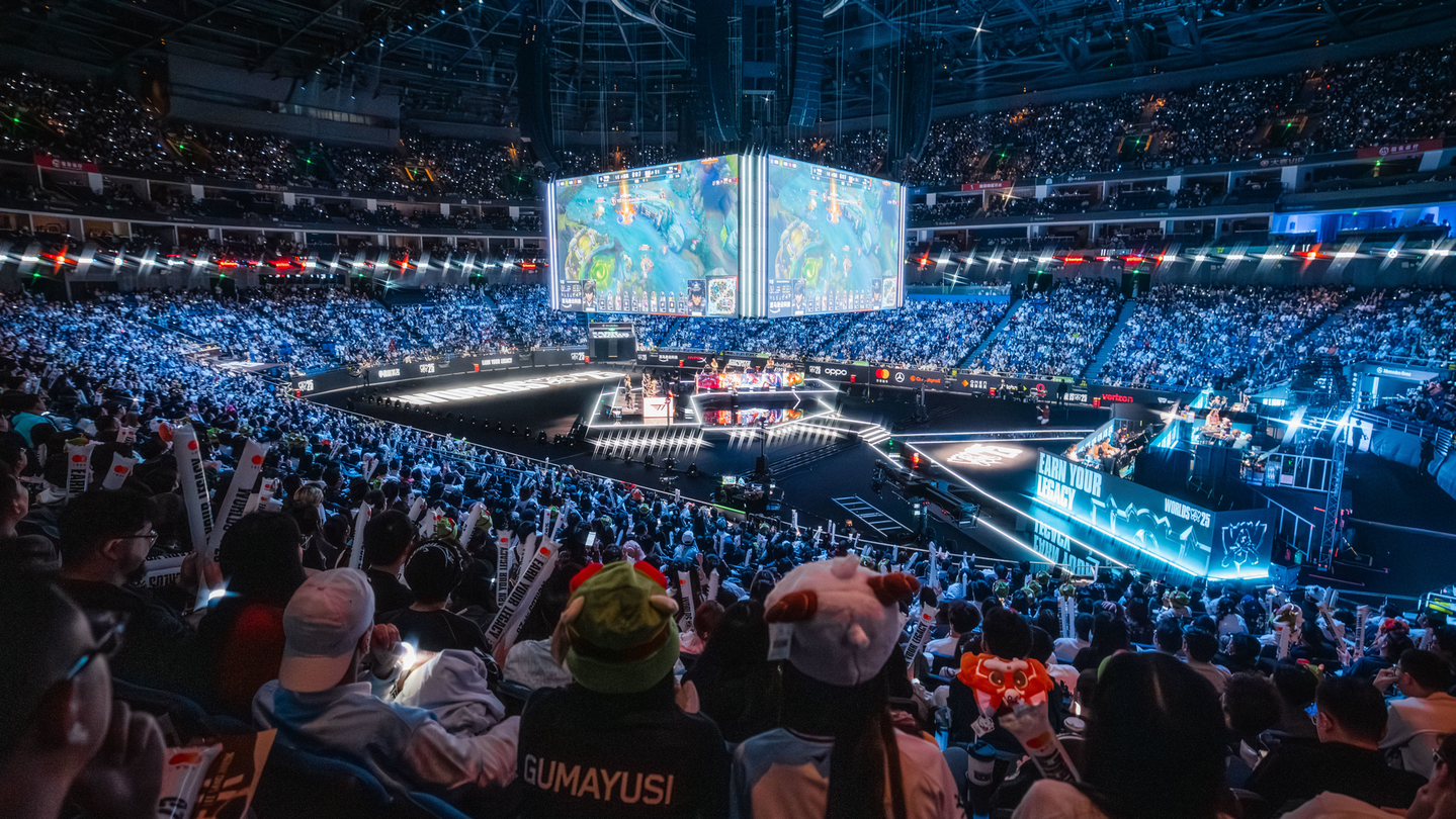 Futuristic AI battle arena in 2025 with digital screens displaying real-time AI agent battles, surrounded by an excited crowd of gamers and developers