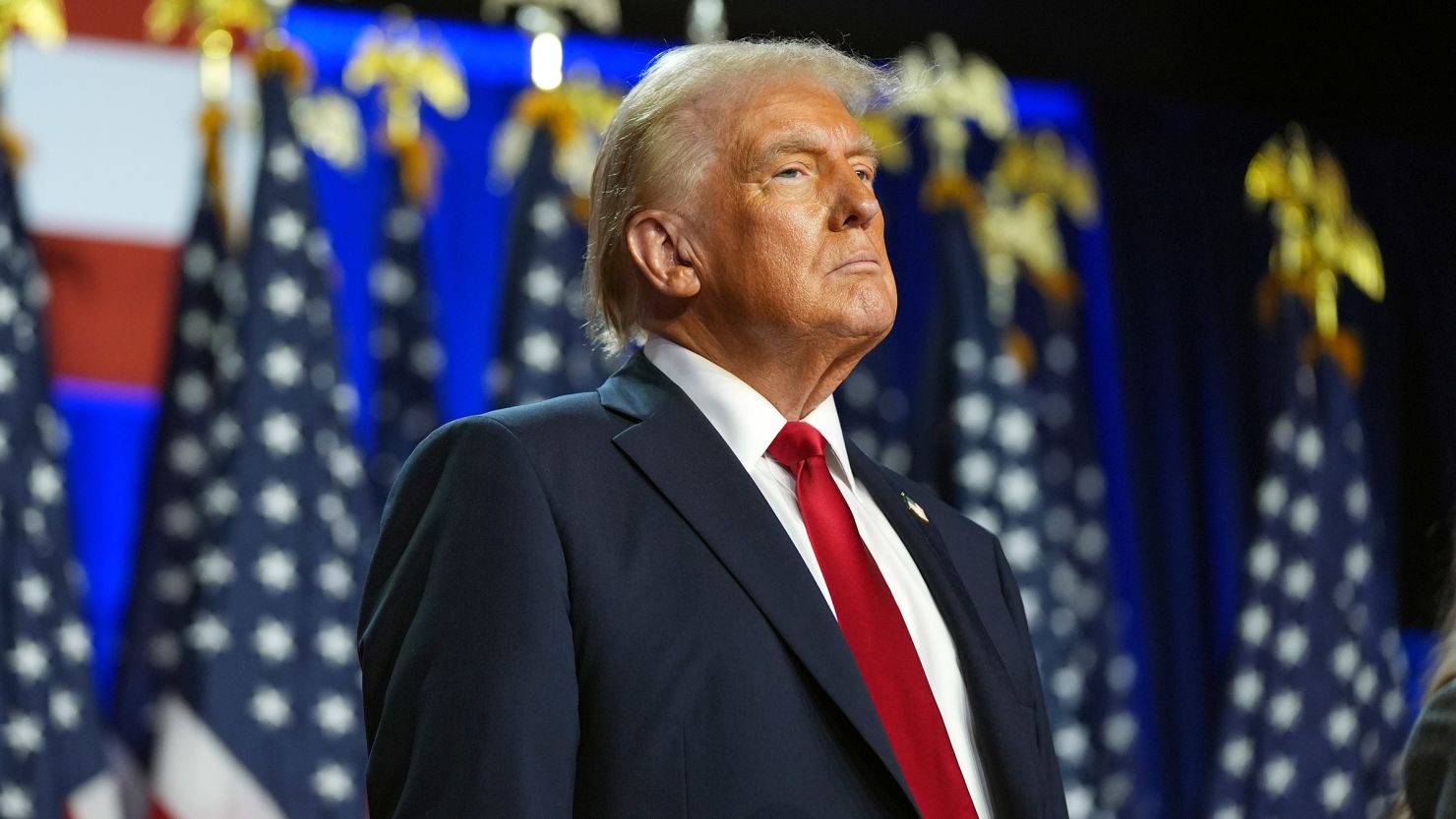 Futuristic blockchain prediction market interface displaying live 2024 US election odds, with digital avatars and decentralized trading elements