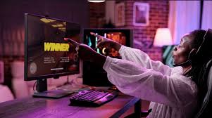 Gamer at desk with PC game and crypto wallet interface open, showcasing blockchain gaming onboarding