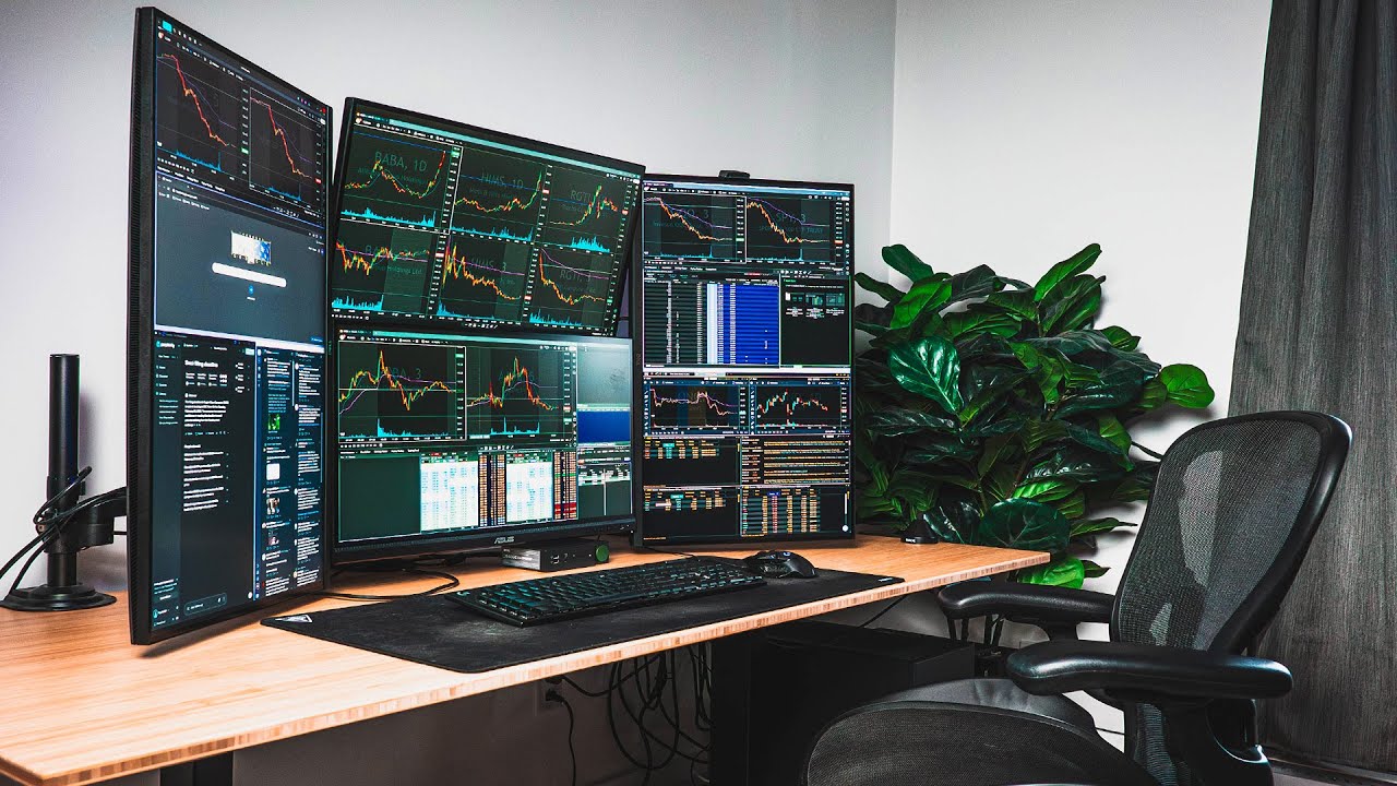Modern desktop setup with crypto trading charts, smartphone displaying real-time crypto prices, and a notepad labeled 'Trading Plan 2024' for beginners