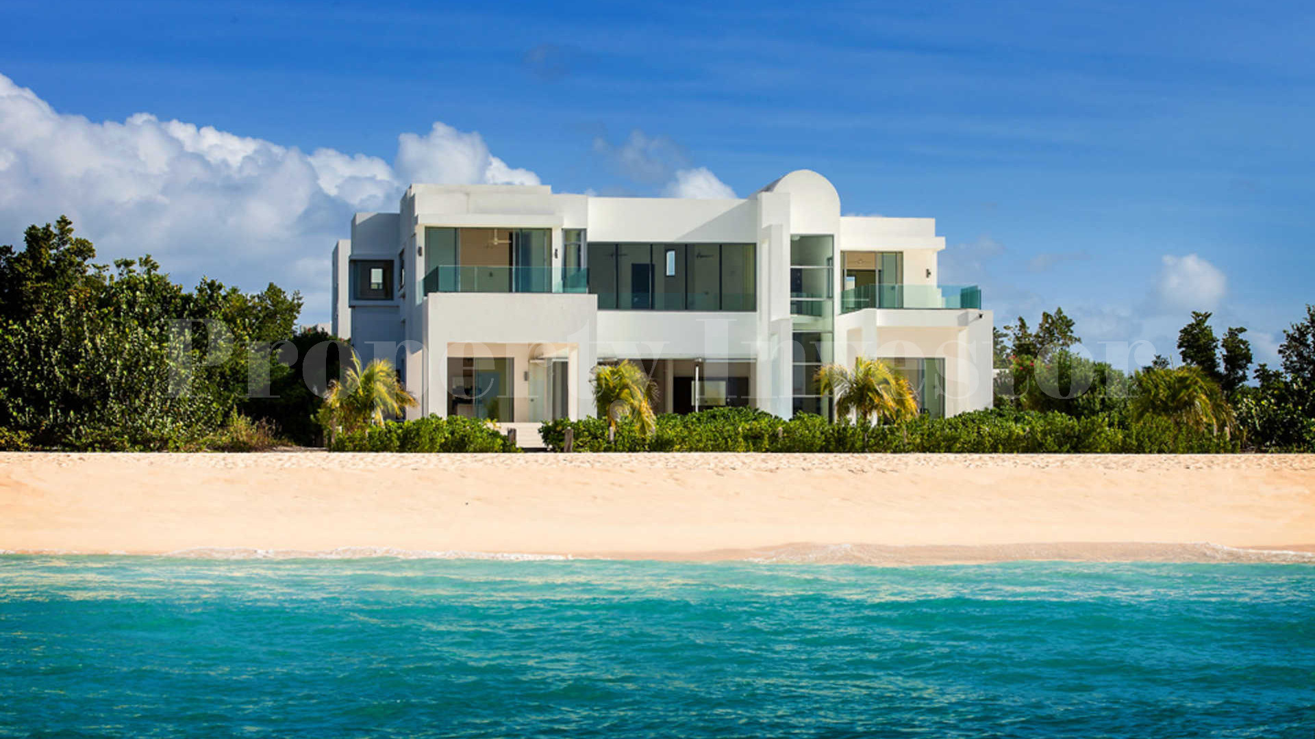 Modern luxury villa overlooking the ocean representing tokenized luxury real estate investment via blockchain technology