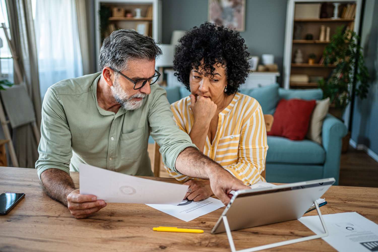 Person reviewing 401(k) retirement dashboard with Bitcoin allocation on laptop