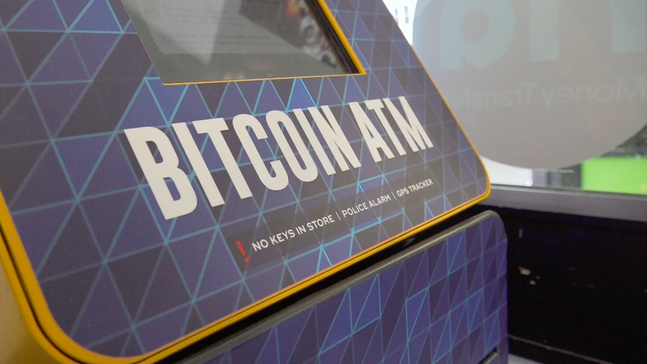 Shuttered crypto ATM kiosk in downtown Auckland after New Zealand ban, illustrating regulatory crackdown on cryptocurrency services