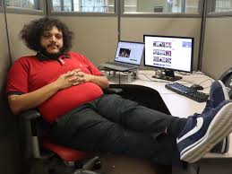 Traveler in a vibrant café checking crypto balances on laptop while following essential safety tips like 2FA, hardware wallet, and verifying official sources