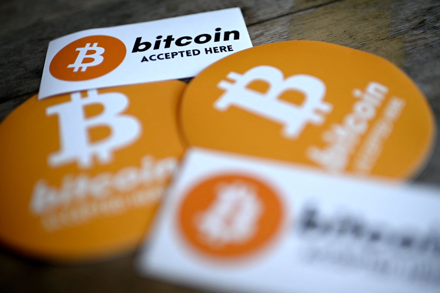 Vibrant crypto trading floor with digital tickers, traders, and Coinbase and Bitcoin logos, symbolizing market surge and mainstream adoption in 2025