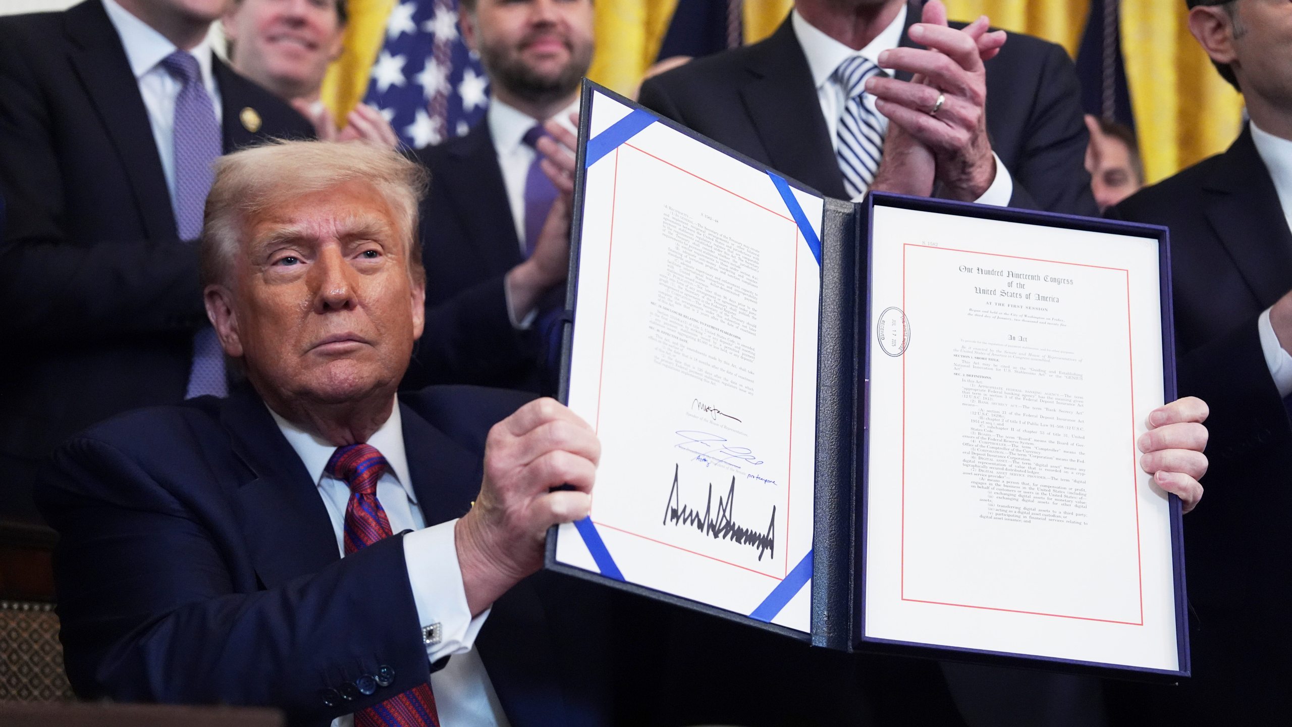 Diverse group discussing 401(k) retirement options with digital crypto assets like Bitcoin and Ethereum, symbolizing new investment opportunities after Trump's executive order.