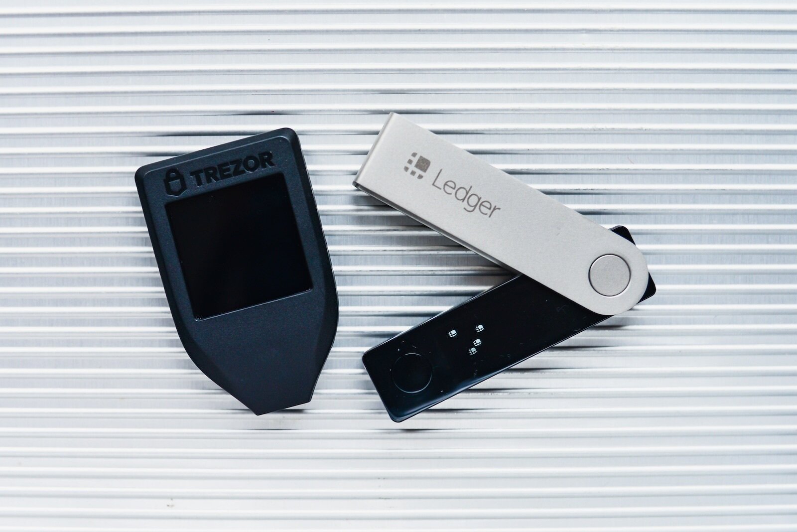 Trezor TS7 color touchscreen vs Ledger Nano X buttons