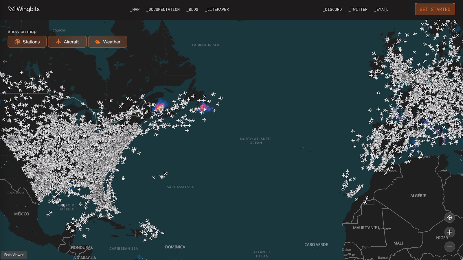 Aerial view of Wingbits ADS-B station tracking global flights on world map backdrop, Solana DePIN aviation network