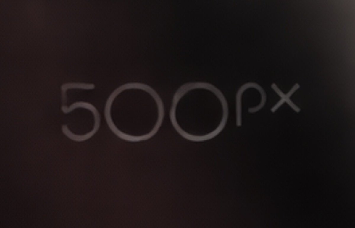 AI-generated image exhibiting persistent 500px watermark artifact overlay from training data like Stable Diffusion LAION dataset