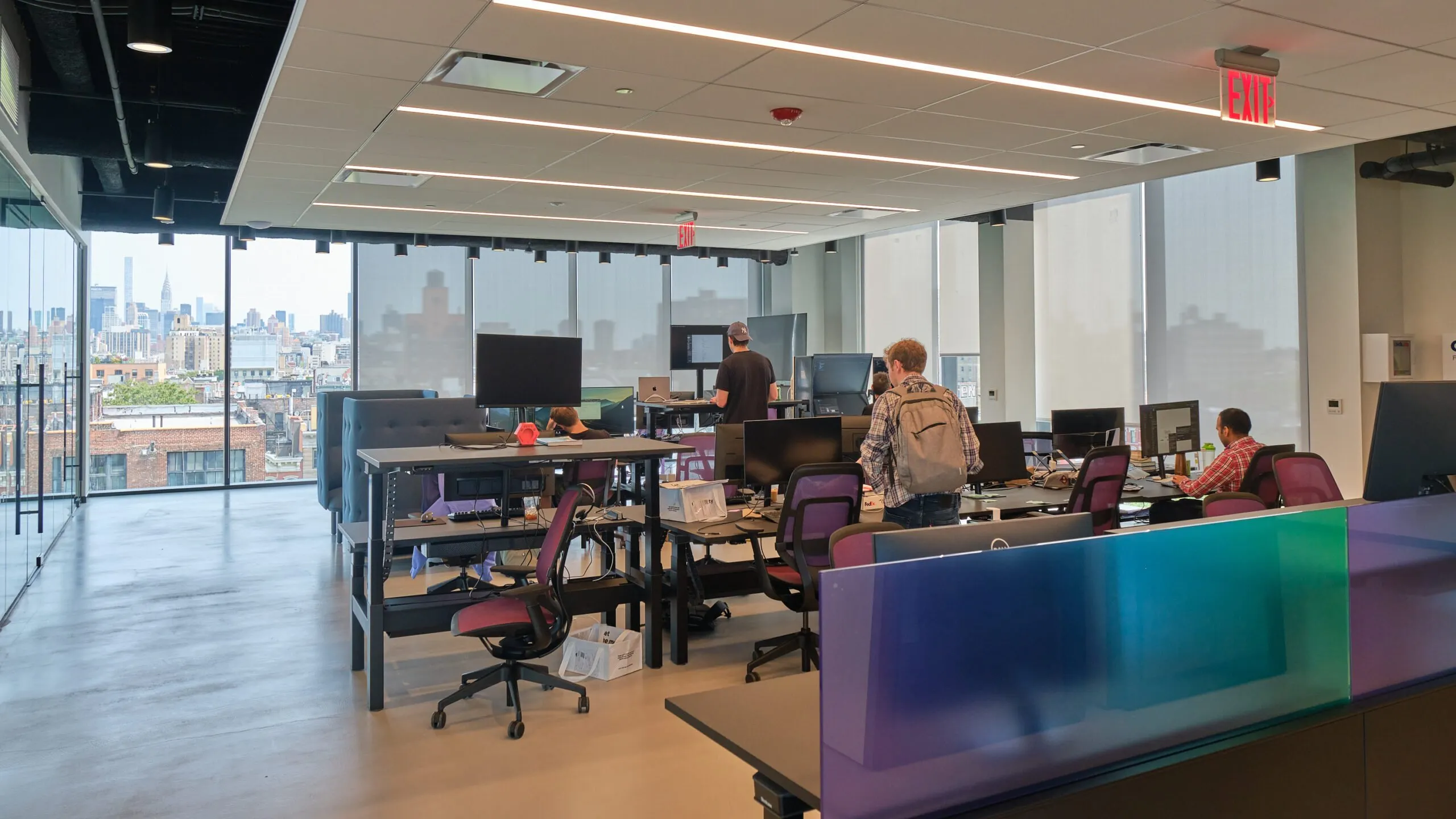 Aerial view of a modern institutional trading floor with digital displays highlighting Solana (SOL) activity, symbolizing blockchain adoption in finance.