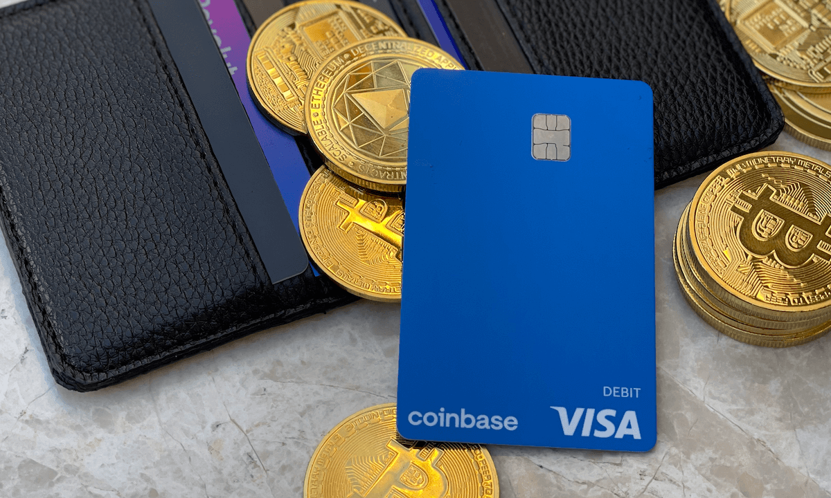 Coinbase logo and crypto rewards debit card example