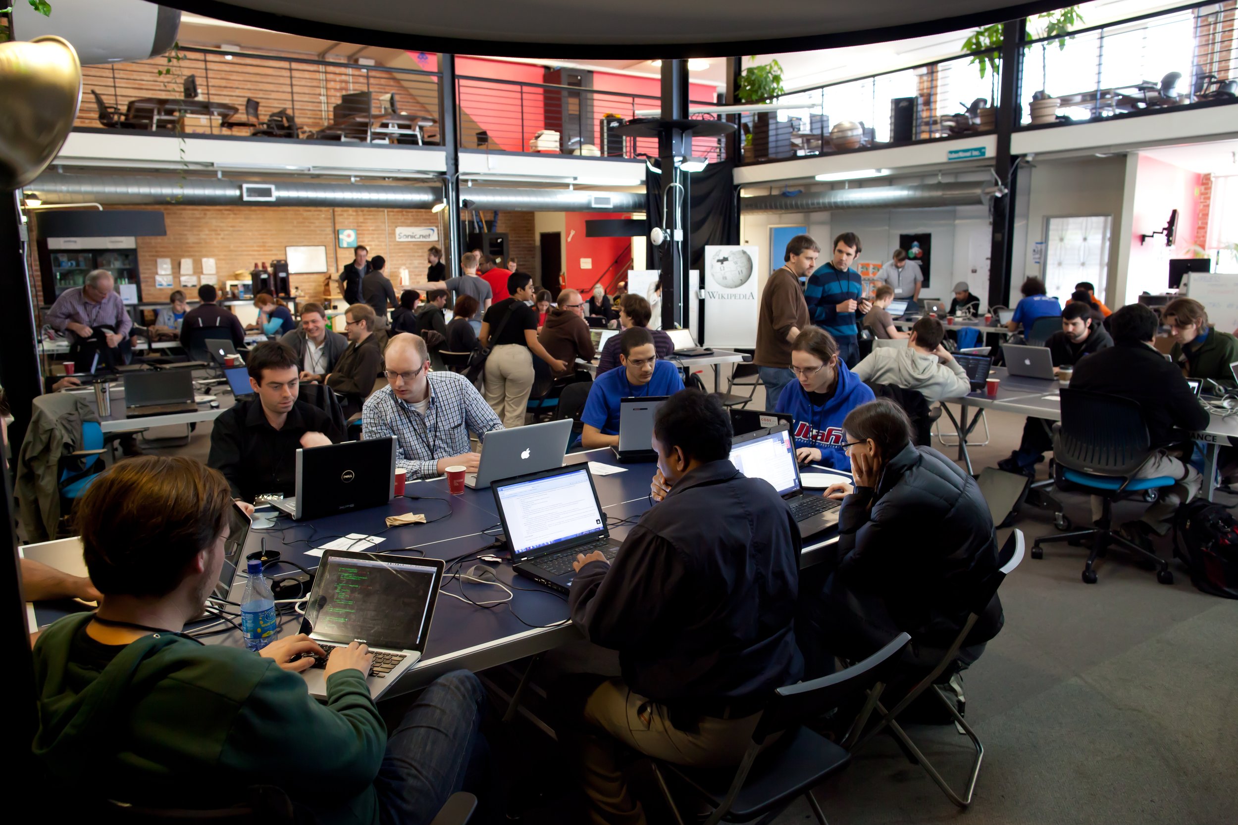 Telegram hackathon event with developers coding
