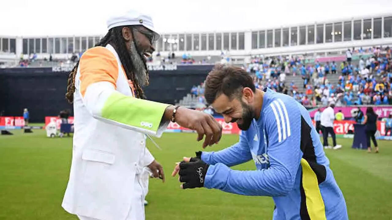 Chris Gayle celebrating with fans at a SIXR Cricket event, highlighting onchain fan engagement and NFTs