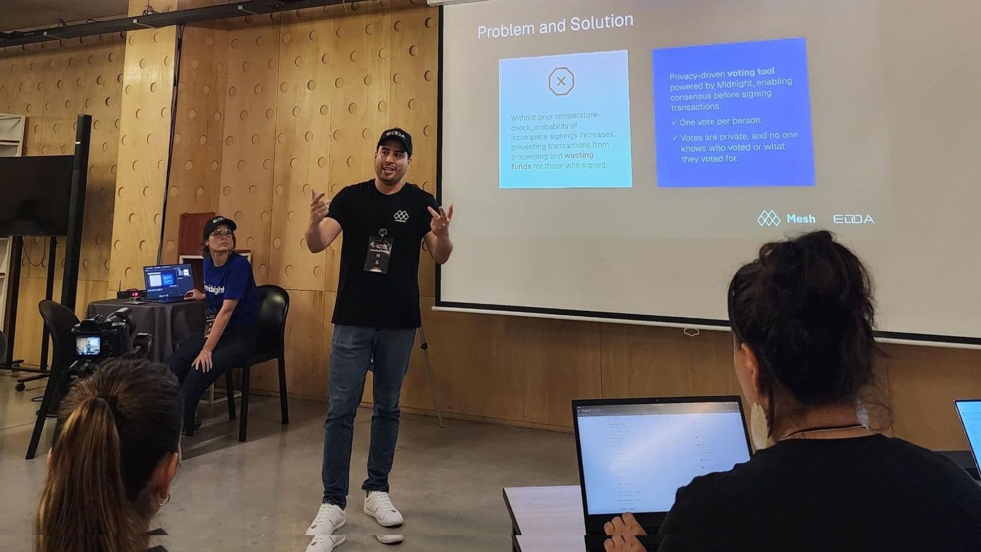 DAO members participating in confidential voting on laptops using shielded voting tools for decentralized governance