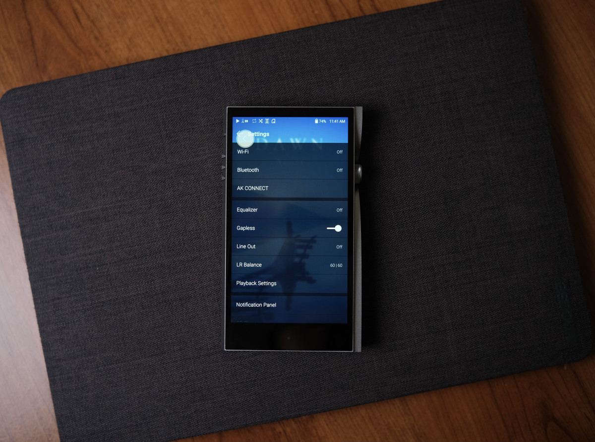 Fans using a mobile app to check $APL token balances while listening to BTS music