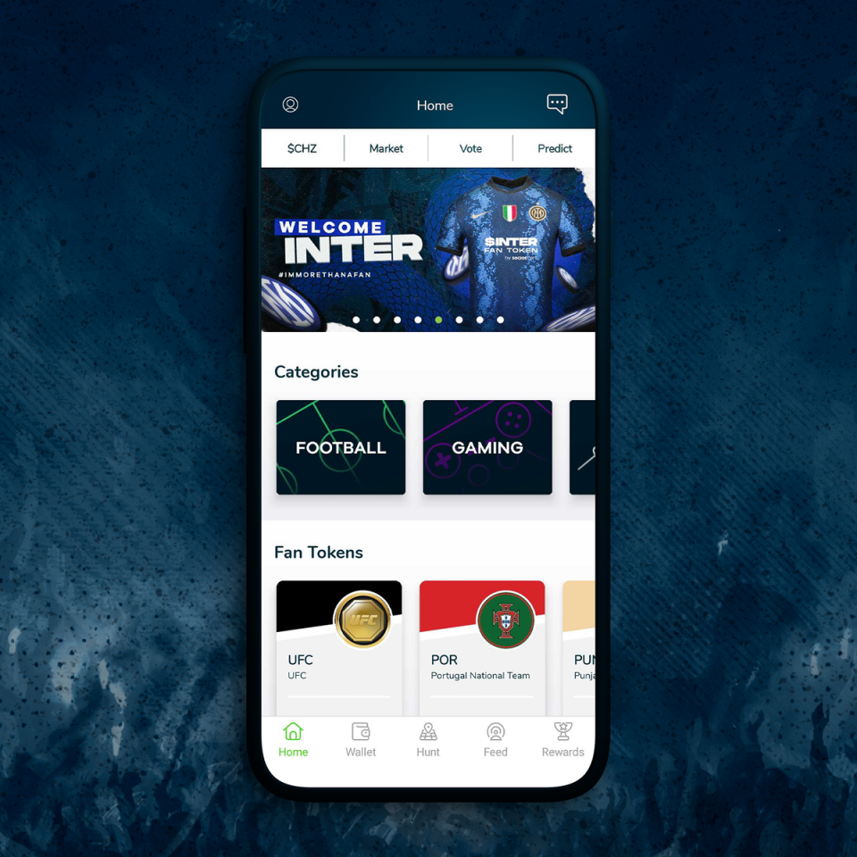 Football fans in a stadium holding smartphones displaying fan token apps, showcasing digital engagement and club support