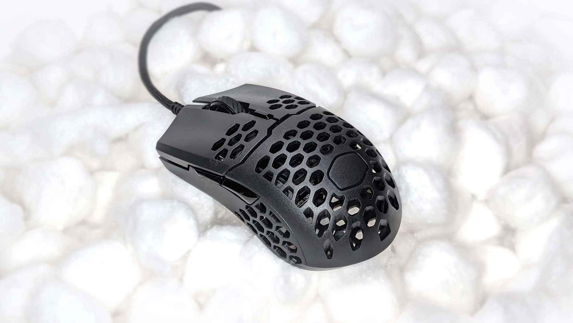 High-resolution close-up of Projects Gaming Sleeper Solana Web3 gaming mouse showcasing premium build quality, lightweight design, and exceptional materials praised in reviews