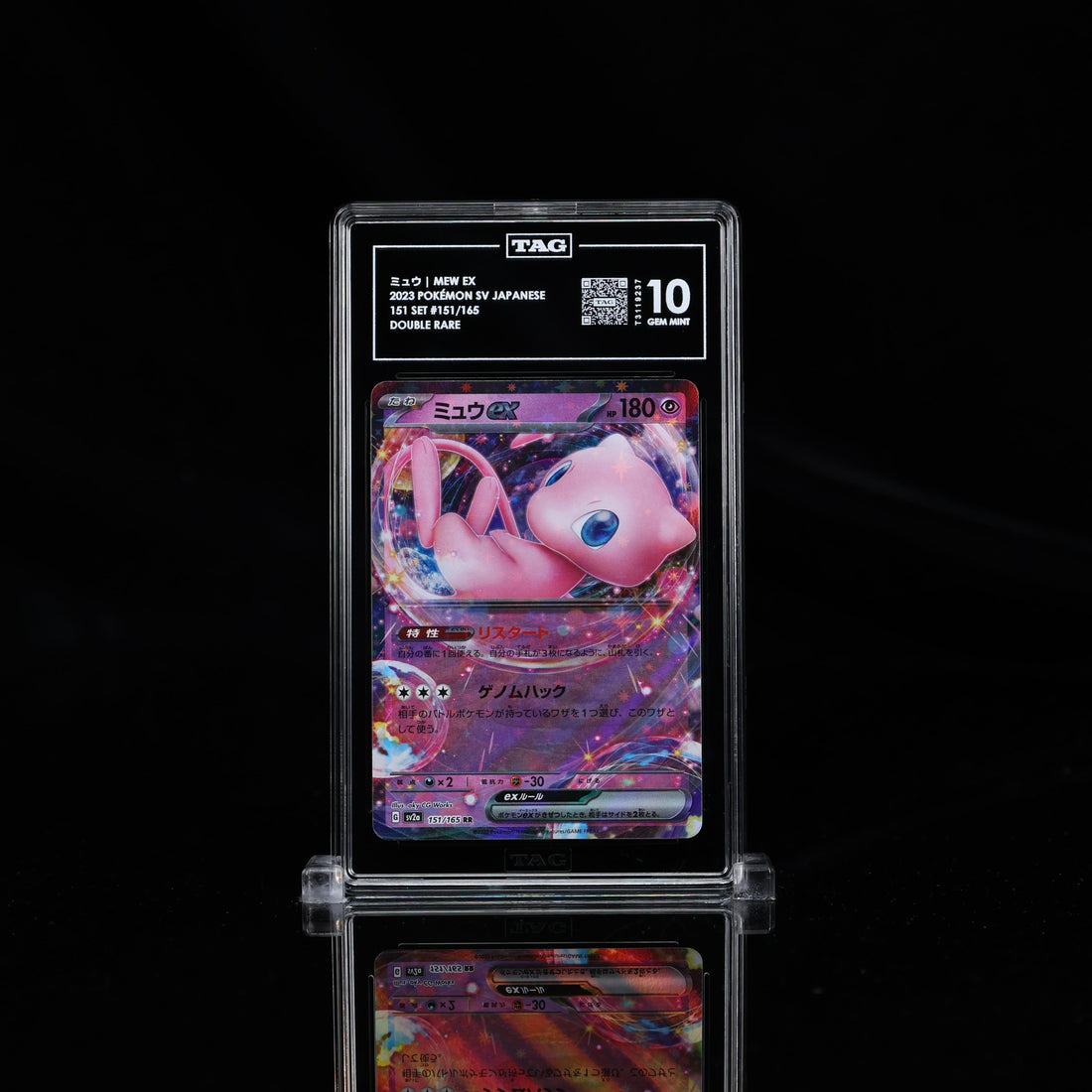 Graded Pokémon card displayed next to a smartphone showing its NFT version, illustrating physical-to-digital tokenization for collectors.