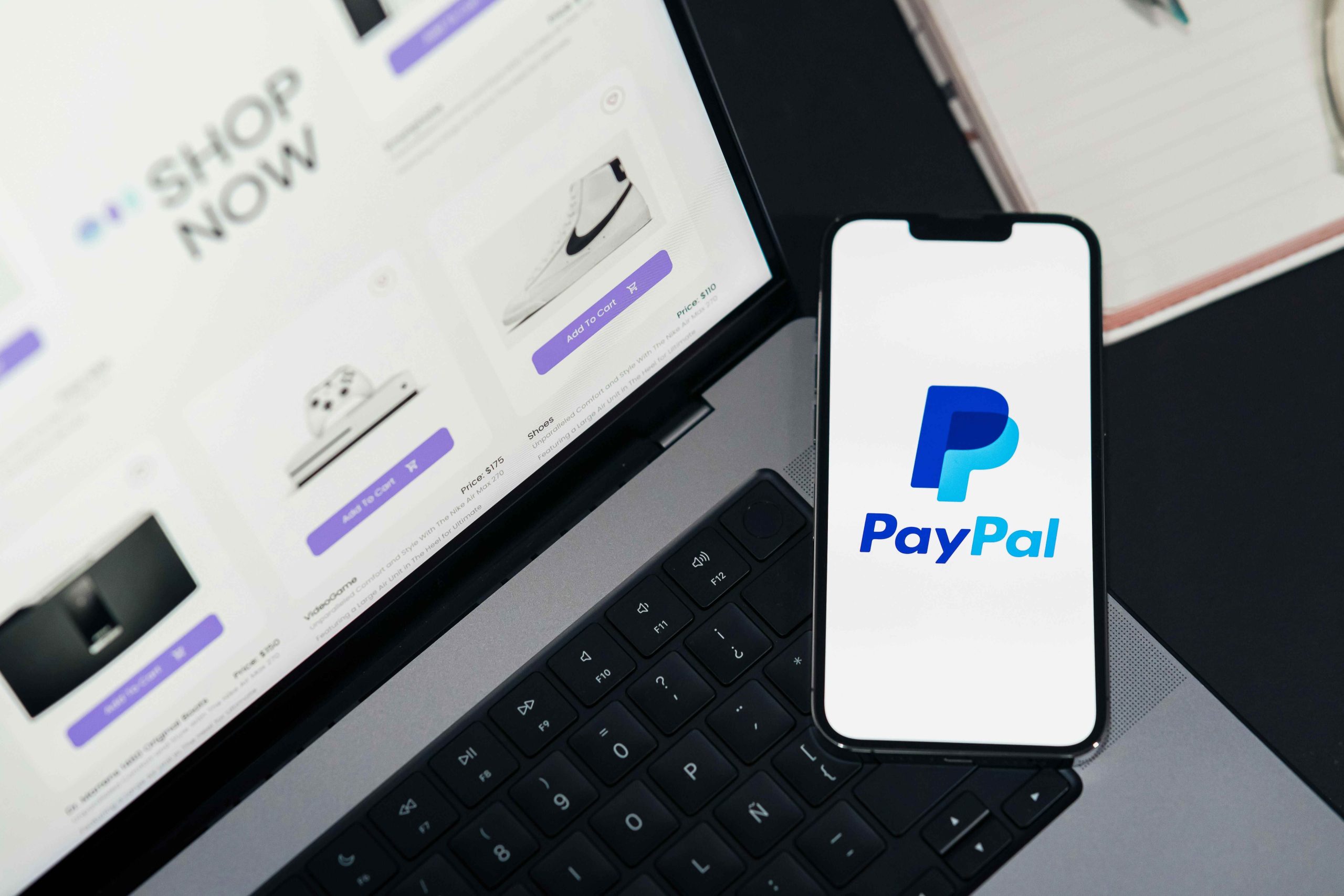 PayPal app interface on smartphone displaying cryptocurrency buy and sell options in 2025