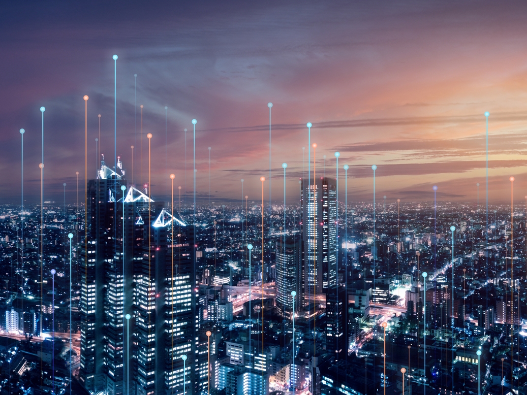 Cityscape illustration with Helium 5G and IoT hotspots connecting smart devices across urban infrastructure