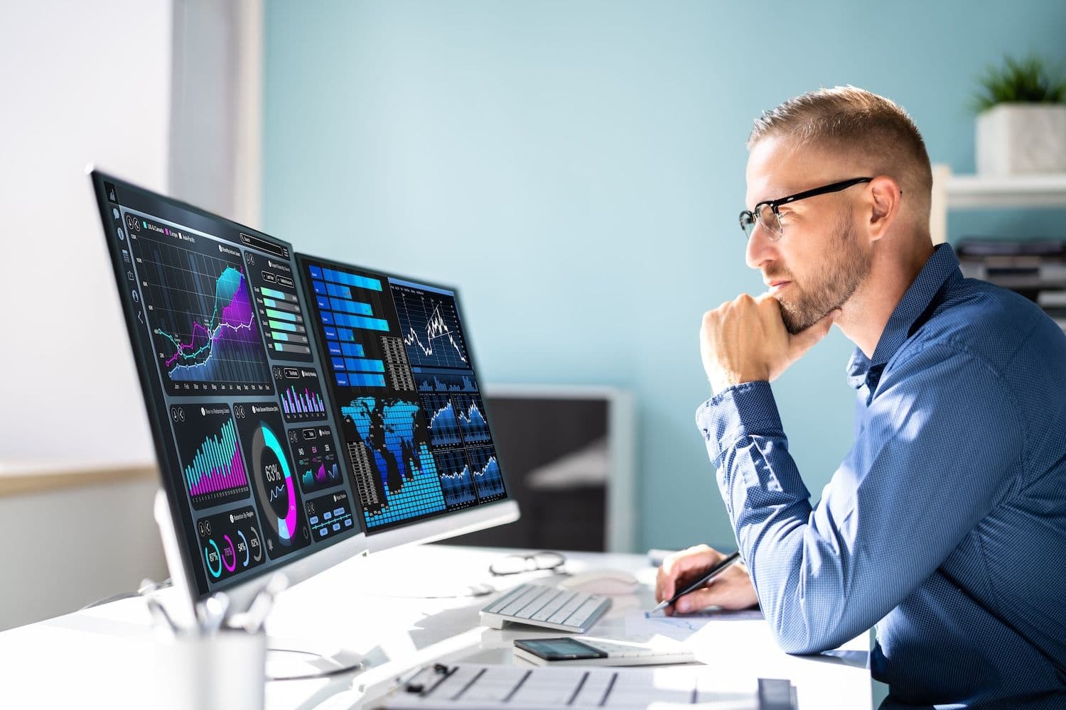 Institutional investors reviewing commodity token market data on digital screens in a modern office setting