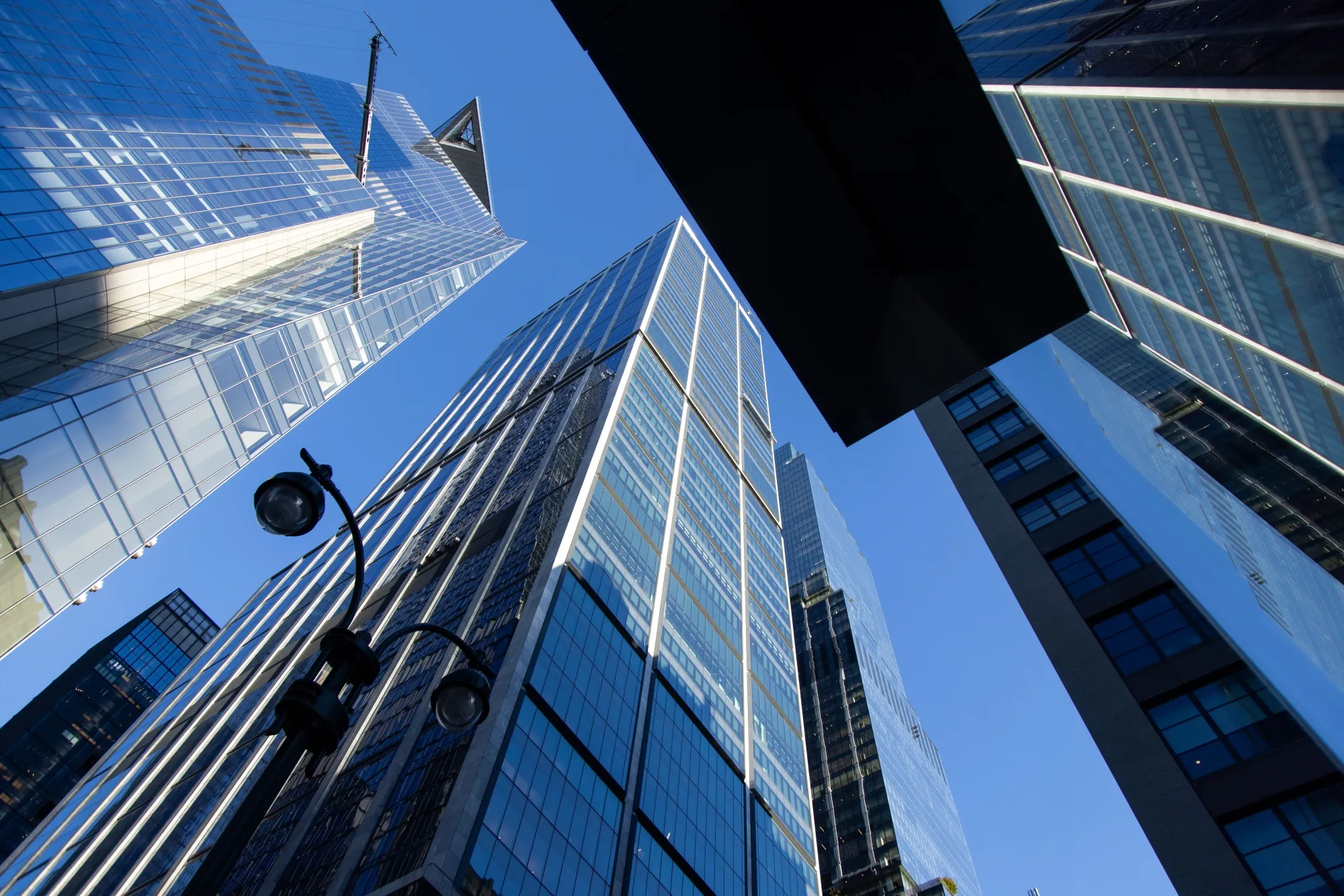 Institutional trader analyzing tokenized T-Bill dashboard on digital workstation in modern office