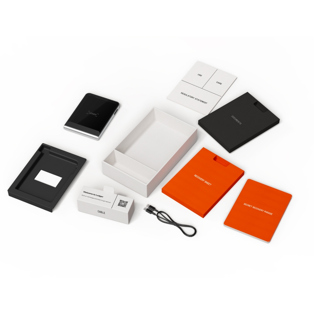 Ledger Flex unboxing with E Ink touchscreen display and included accessories such as USB-C cable and recovery sheets