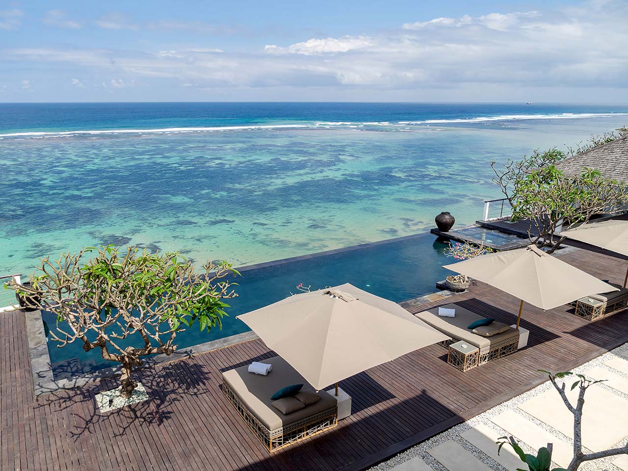Luxury Bali villa with infinity pool and ocean view, perfect for tokenized real estate fractional ownership investments starting at $50 on blockchain platforms
