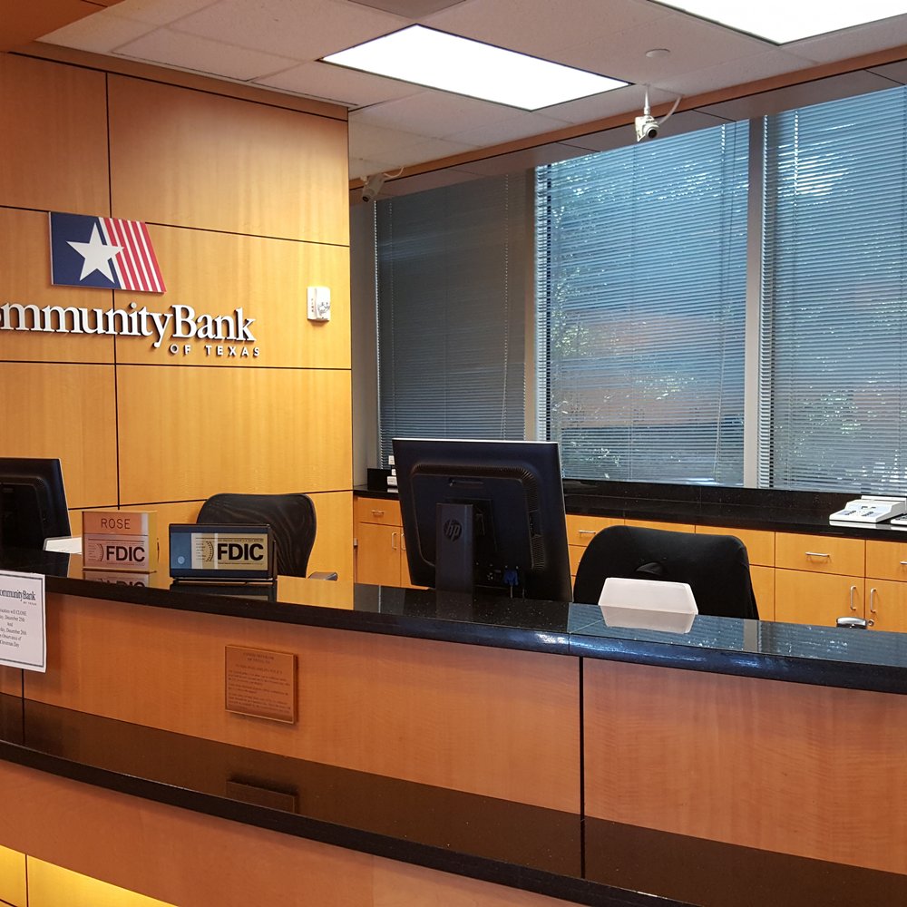 Modern bank branch interior featuring Citibank, PNC Bank, and KeyBank digital asset kiosks with visible crypto branding, illustrating US banks' crypto on/off ramp services in 2025.