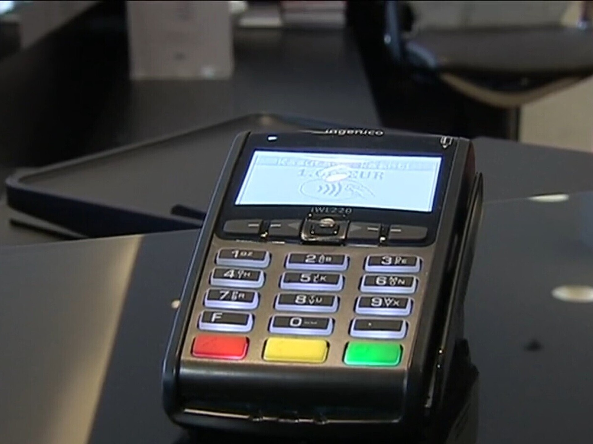 Modern USDC POS terminal screen displaying offline transaction confirmation in a busy retail store accepting cryptocurrency payments