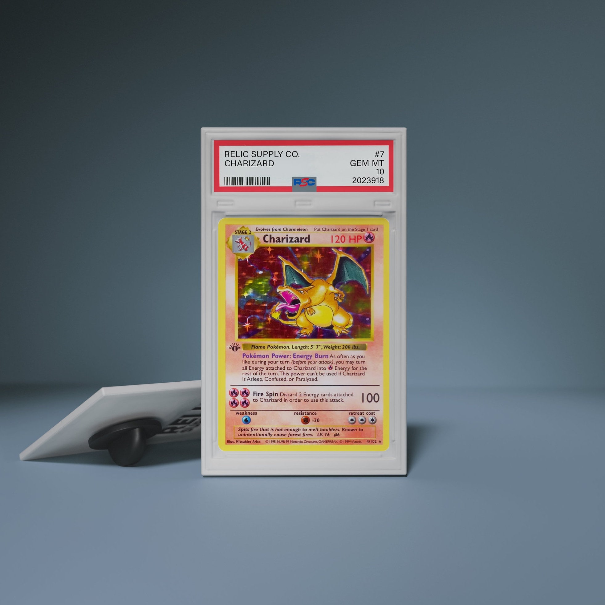 PSA 10 Gem Mint graded Charizard Pokémon card slab with Solana blockchain token overlay, illustrating RWA tokenization on TCGOnChain and RE:VERSE platforms