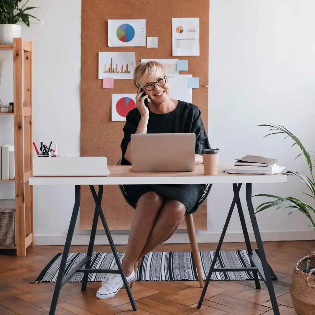 Remote developer working on a laptop in a modern coworking space in Latin America, representing USDC payroll for international teams