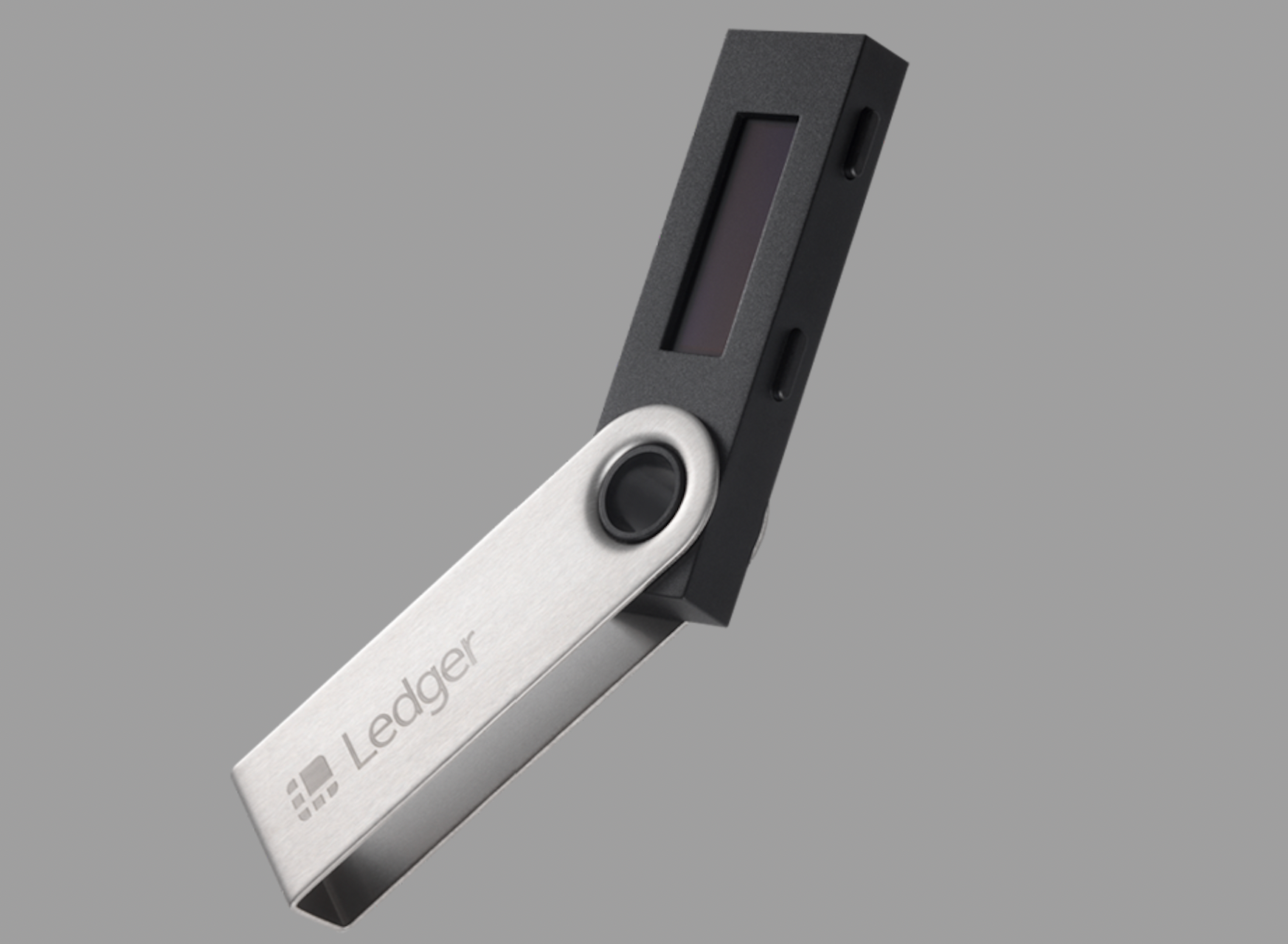 Trust Wallet app interface displayed on a smartphone next to a Ledger Nano X hardware wallet for a visual comparison of crypto wallet security and user experience.