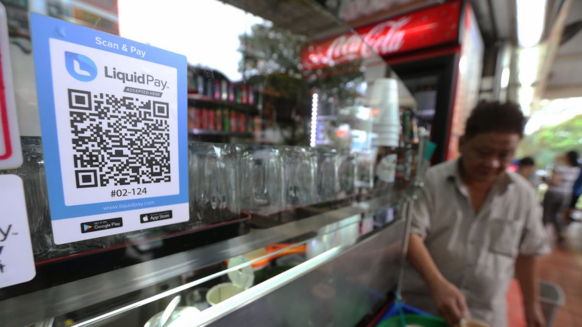 Singapore hawker centre merchants accepting stablecoin crypto payments via QR codes