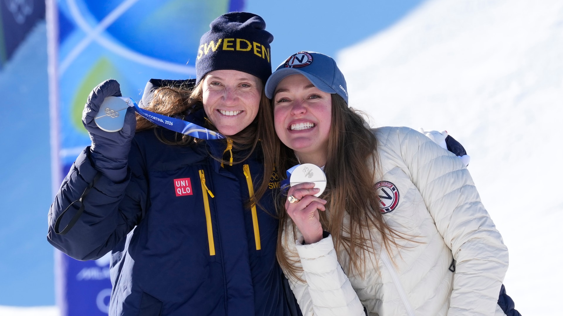 Triumphant Norway team celebrating record 18 gold medals at 2026 Milano Cortina Winter Olympics medal ceremony with snowy Alps backdrop